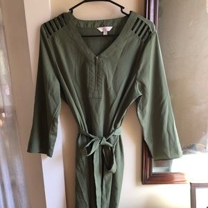 CC green dress with cut out shoulder details.
